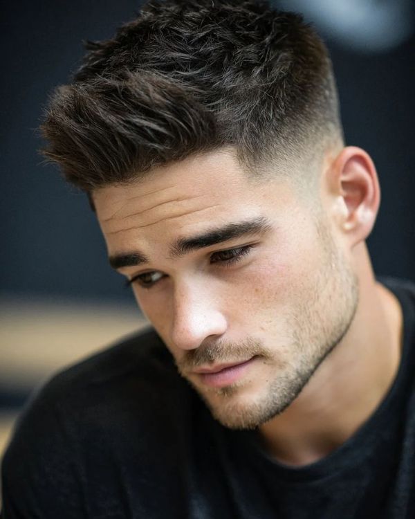 Textured Short Hairstyle with Mid Fade