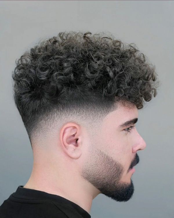 Messy Curly Mohawk with Taper Fade
